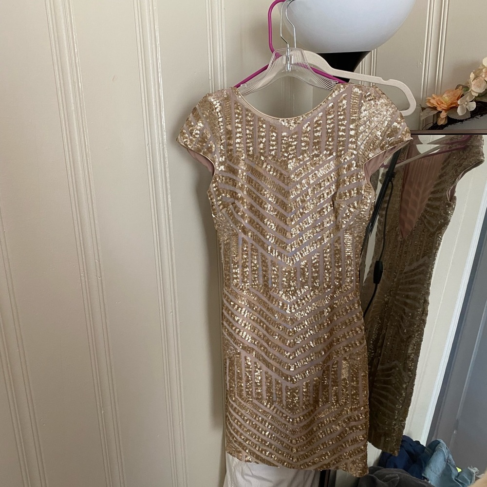 Gold sequin mini dress open back